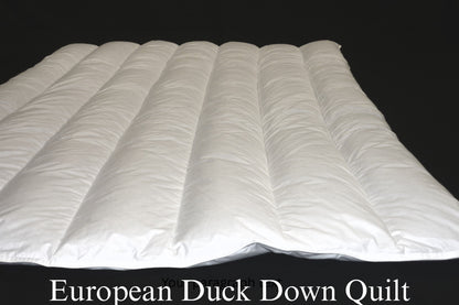 White European Duck Down quilt on a black background with text overlay.